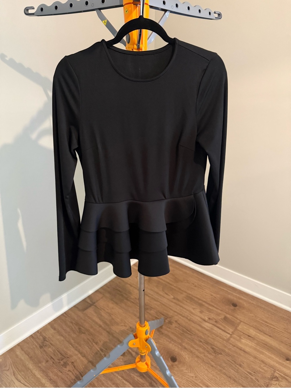 Women’s Black Long-Sleeve Peplum Top